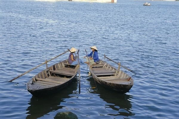 Two women in boats