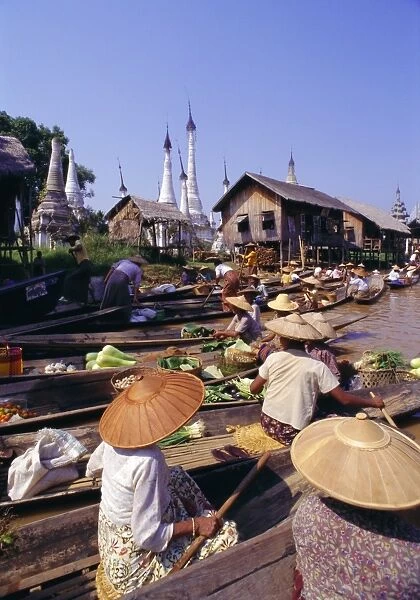Women in boats selling vegetables, floating market on the lake, Inle Lake