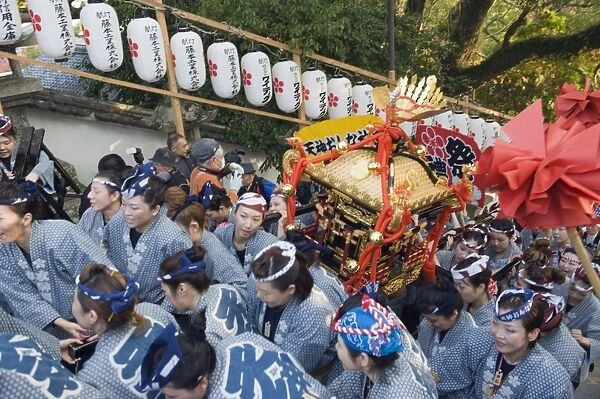 Women carrying a mikoshi portable shrine at Hadaka Matsuri (Naked Festival)