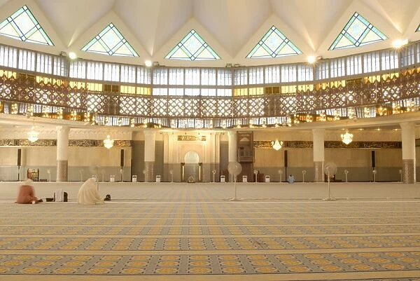 Two women inside prayer hall of National (Negara) Mosque