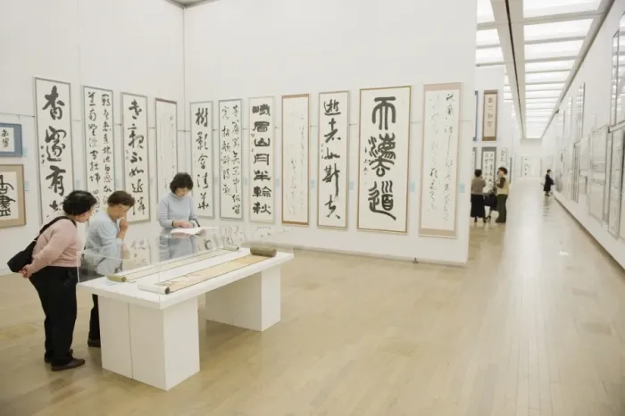 Framed Print : Women looking at calligraphy exhibition inside Kisho Kurokawa, 2007, National Art Centre Framed Print : Women looking at calligraphy exhibition inside Kisho Kurokawa, 2007, National Art Centre