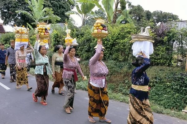 Women in procession for funeral ceremony