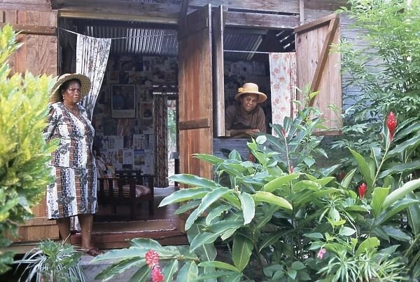 Two women, typical Creole house