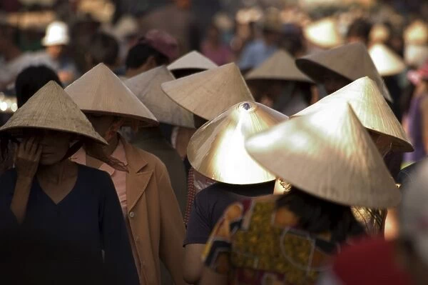 Women wearing conical hats