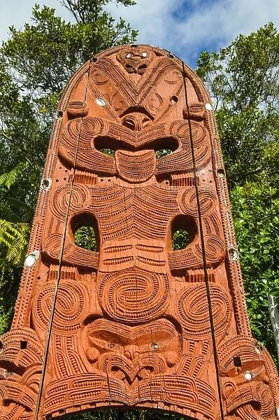 Woodecarved entrance at the Te Puia Maori Cultural Center, Rotorura, North Island, New Zealand, Pacific