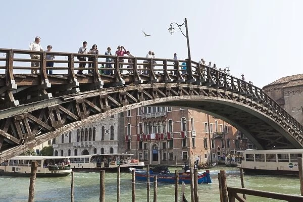 The wooden Accademia Bridge over the Grand Canal, Venice, UNESCO World Heritage Site