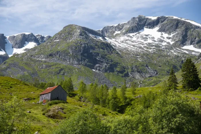 Framed Print : A wooden barn on a hillside below the Frudalsbreen Glacier, Vestlandet, Norway Framed Print : A wooden barn on a hillside below the Frudalsbreen Glacier, Vestlandet, Norway