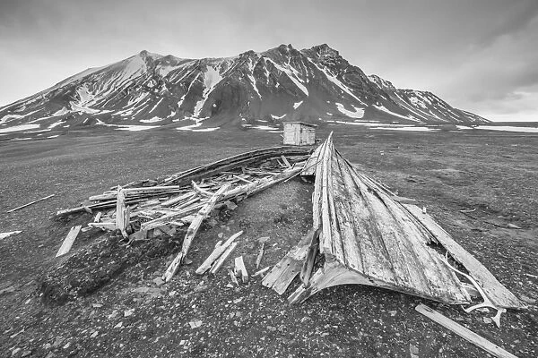 Wooden boat and cabin Bamsebu at Ahlstrandhalvoya, Bellsund, Svalbard, Norway, Scandinavia, Europe