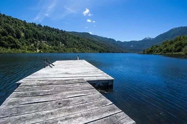Wooden boat pier on Lago Tinquilco in the Huerquehue, southern Chile