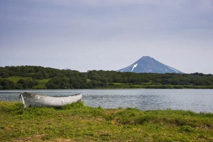 Framed Print : Wooden canoe in front of the Ilyinsky (volcano) and Kurile Lake, Kamchatka, Russia, Eurasia Framed Print : Wooden canoe in front of the Ilyinsky (volcano) and Kurile Lake, Kamchatka, Russia, Eurasia