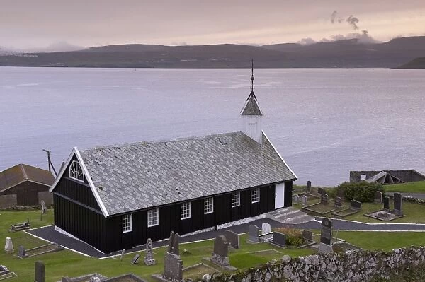 Wooden church at Nes dating from 1843, view across Tangafjordur towards Streymoy