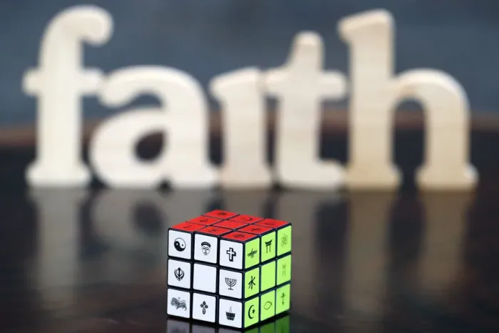 Framed Print : Wooden letters forming the word FAITH and Rubiks cube with religious symbols Framed Print : Wooden letters forming the word FAITH and Rubiks cube with religious symbols