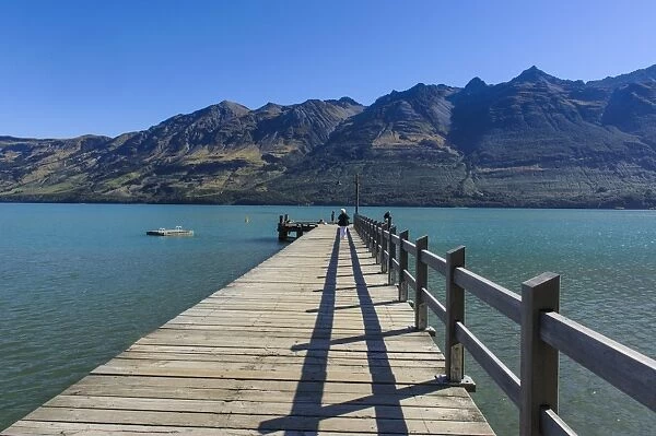 Wooden pier in the turquoise water of Lake Wakatipu, Glenorchy around Queenstown, Otago, South Island, New Zealand, Pacific