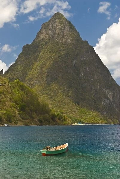 A wooden rowboat is lying in the Atlantic Ocean, St. Lucia, Windward Islands