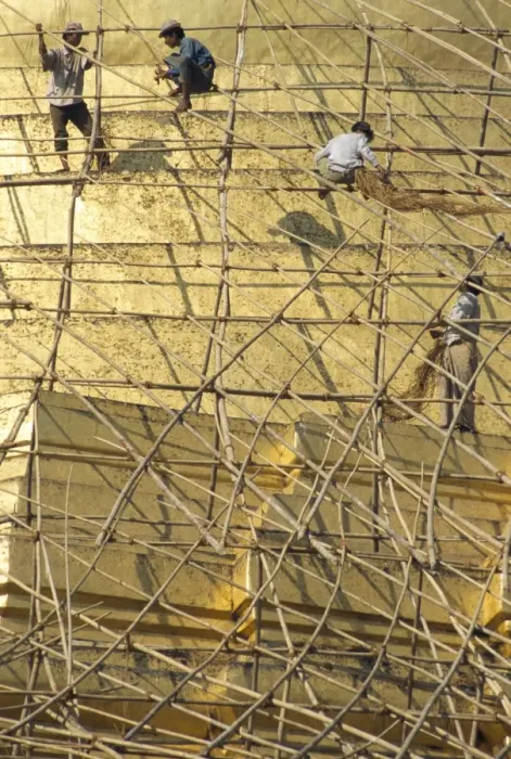 Framed Print : Workers on bamboo scaffolding applying fresh gold leaf to the Shwedagon Pagoda Framed Print : Workers on bamboo scaffolding applying fresh gold leaf to the Shwedagon Pagoda