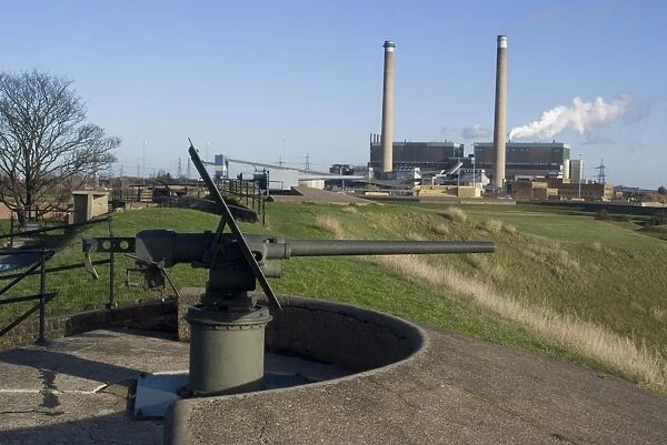 World War II gun with power station behind, at Tilbury Fort, used from the 16th to the 20th century