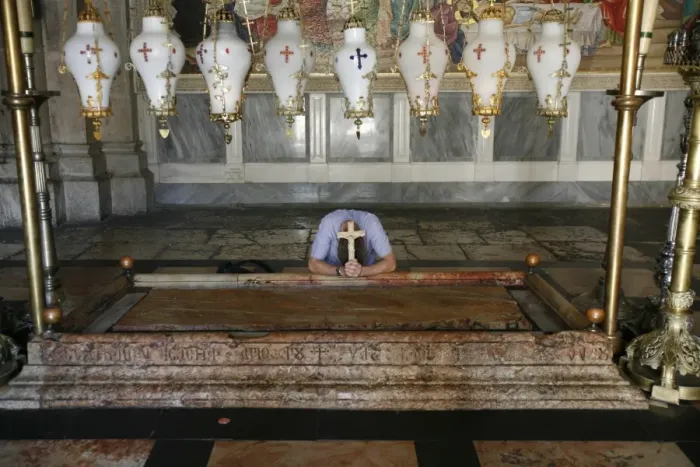 Framed Print : Worshipper at the Stone of the Anointing, Church of the Holy Sepulchre Framed Print : Worshipper at the Stone of the Anointing, Church of the Holy Sepulchre
