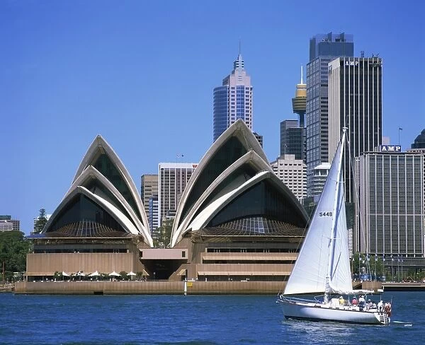 Yacht in Sydney Harbour before the Opera House, UNESCO World Heritage Site
