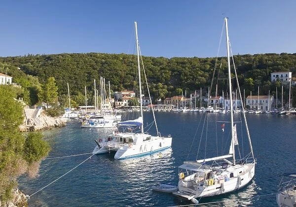 Yachts at anchor in the pretty harbour, Kioni, Ithaca (Ithaki), Ionian Islands, Greek Islands, Greece, Europe