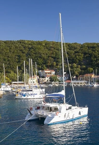 Yachts at anchor in the pretty harbour, Kioni, Ithaca (Ithaki), Ionian Islands, Greek Islands, Greece, Europe