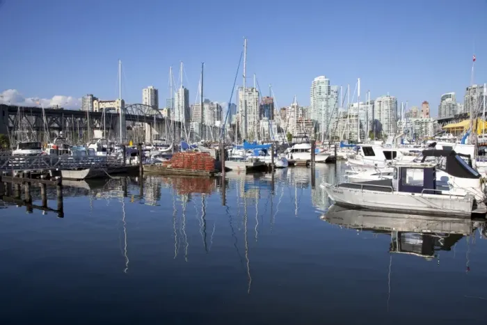 Framed Print : Yachts moored in False Creek at Granville Island with Burrard Bridge, Vancouver