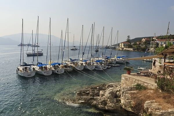 Yachts and ships at anchor, Fiskardo, Kefalonia (Cephalonia), Ionian Islands, Greek Islands, Greece, Europe