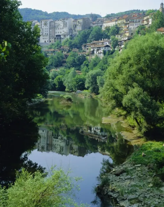 Framed Print : The Yantra River and Veliko Turnovo City behind on side of hill, Bulgaria Framed Print : The Yantra River and Veliko Turnovo City behind on side of hill, Bulgaria