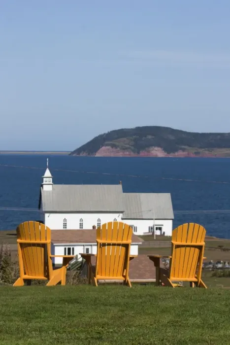 Framed Print : Yellow Adirondack chairs overlooking church on an island in the Gulf of St Framed Print : Yellow Adirondack chairs overlooking church on an island in the Gulf of St