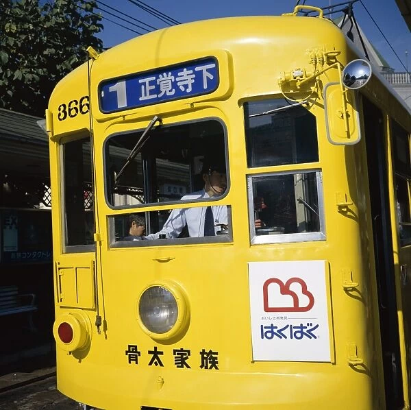 Yellow public tram at Matsuyama