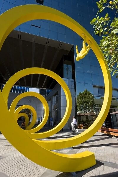 Yellow spiral sculpture in the central business district, Santiago, Chile, South America