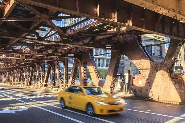 Yellow taxi crossing a bridge over the Chicago River, Chicago, Illinois, United States of America, North America