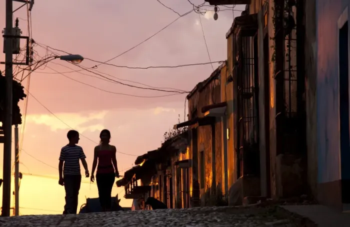 Framed Print : Two young people in silhouette at sunset on cobbled street with colourful orange sky behind, Trinidad, UNESCO World Heritage Site, Cuba, West Indies, Central America Framed Print : Two young people in silhouette at sunset on cobbled street with colourful orange sky behind, Trinidad, UNESCO World Heritage Site, Cuba, West Indies, Central America