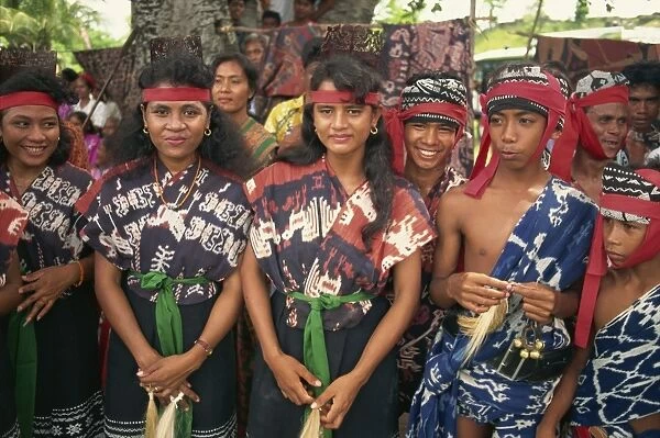 Young people wearing ikat designs, Sumba, Indonesia, Southeast Asia, Asia