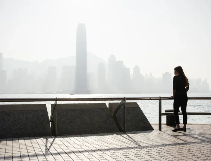 Framed Print : Young woman standing on Tsim Sha Tsui Waterfront, Kowloon, Hong Kong, China, Asia Framed Print : Young woman standing on Tsim Sha Tsui Waterfront, Kowloon, Hong Kong, China, Asia