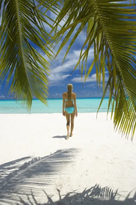 Framed Print : Young woman walking on beach, Maldives, Indian Ocean, Asia Framed Print : Young woman walking on beach, Maldives, Indian Ocean, Asia