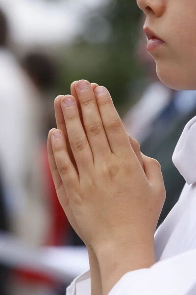 Youth praying, Paris, France, Europe