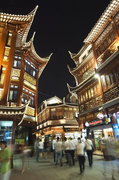 Yuyuan (Yu yuan) Garden Bazaar buildings founded by Ming dynasty Pan family illuminated in the Old Chinese city district, Shanghai