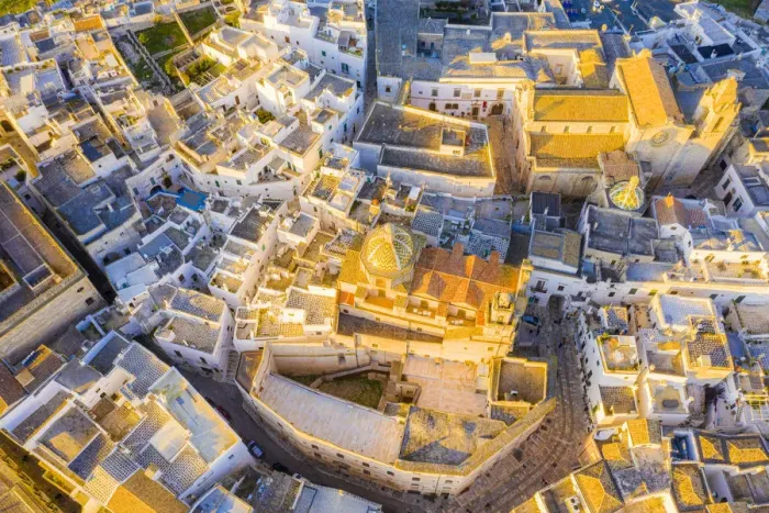 Framed Print : Zenithal aerial view of the old town of Ostuni at sunset, Apulia, Italy, Europe Framed Print : Zenithal aerial view of the old town of Ostuni at sunset, Apulia, Italy, Europe