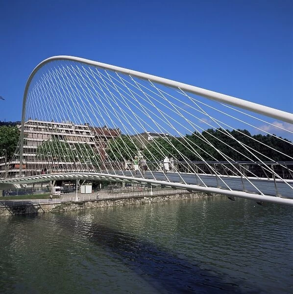 Zubizuri curved pedestrian bridge across the Bilbao River