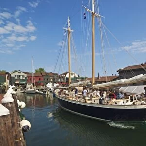 The 80 foot excursion schooner Aquidneck returning to Bowens Wharf