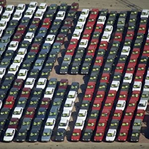 Aerial of cars lined up on the docks at the port of