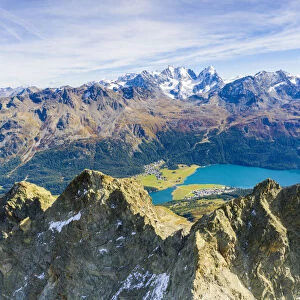 Aerial by drone of Lake Silvaplana and Bernina mountain range in summer, Engadine