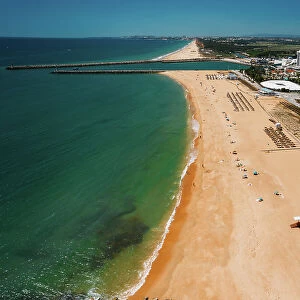 Aerial drone view of Praia de Vilamoura in Vilamoura, looking west, Algarve, Portugal, Europe