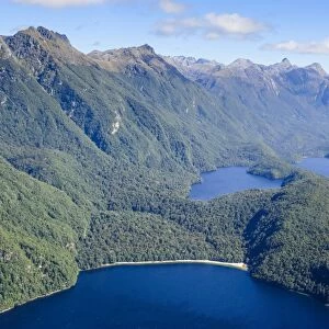 Aerial of a huge fjord in Fiordland National Park, UNESCO World Heritage Site, South Island, New Zealand, Pacific