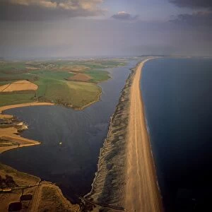 Aerial image of Chesil Beach (Chesil Bank), 29 km long shingle beach, a tombolo connecting mainland to the Isle of Portland, Jurassic Coast, UNESCO World Heritage Site, Dorset, England, United