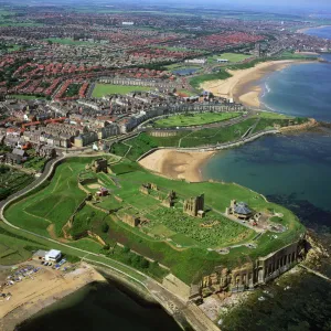 Aerial image of Tynemouth Priory and Castle, on a rocky headland known as Pen Bal Crag