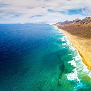 Aerial panoramic of mountains and Cofete Beach in Jandia Natural Park, Fuerteventura