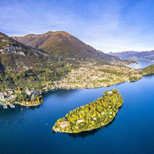 Aerial view of Comacina Island and Tremezzina in autumn, Lake Como, Lombardy