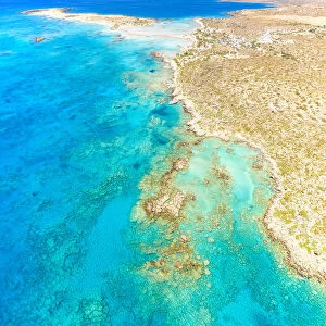 Aerial view of crystal transparent sea washing the sand beach of Elafonisi, Crete island, Greek Islands, Greece, Europe