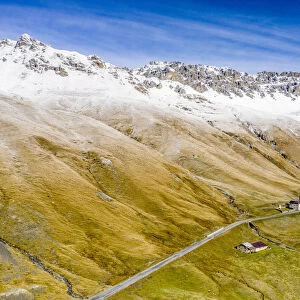 Aerial view by drone of Piz Umbrail and Punta di Rims in autumn, Braulio Valley, Bormio